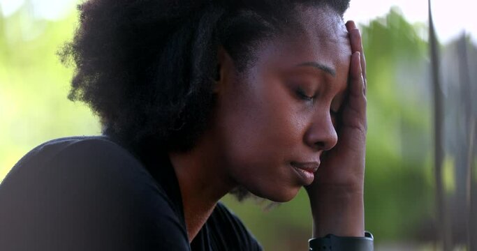Preoccupied black woman feeling stress and pressure. African person suffering