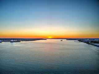 Fototapeta premium Aerial View of a Sunset over the Delaware River Philadelphia 