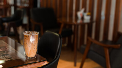 iced coffee on the table inside the cafe