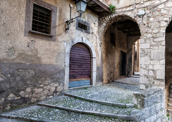 Fototapeta na wymiar Guardia Sanframondi, Italy, alleys between the old houses of a medieval village in the province of Benevento, Italy. 