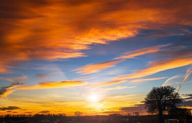 colorful sky with sun in clouds of altitude . religious background