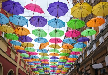 Fototapeta premium umbrellas against a sunny sky. summer background