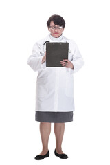in full growth. senior female doctor with a clipboard.