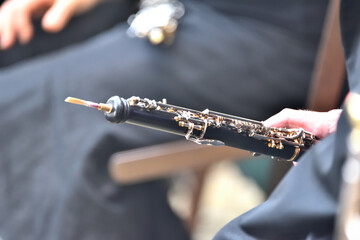 oboe in the hands of a musician, during a classical music concert - obrazy, fototapety, plakaty