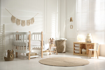 Baby room interior with stylish furniture and toys - Powered by Adobe
