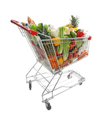 Shopping cart with groceries on white background