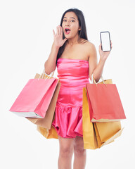 Woman with shopping bags and smartphone