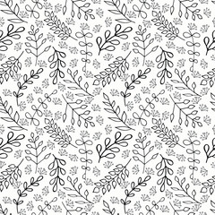Fototapeta premium Floral seamless pattern with black branches on white background. Ornament with tropic leaves, sprigs.