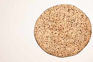 Tasty matzo isolated on white, top view. Passover (Pesach) celebration