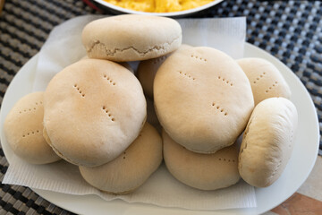 Chilean country bread on plate. Traditional homemade breakfast recipe