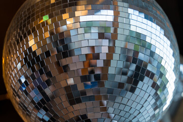 Mosaic mirror classic disco ball. Closeup on spherical discotheque glitterball