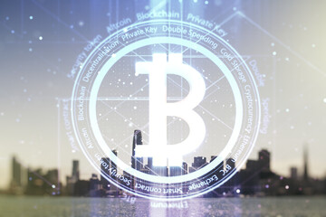 Virtual Bitcoin hologram on San Francisco skyline background. Multiexposure