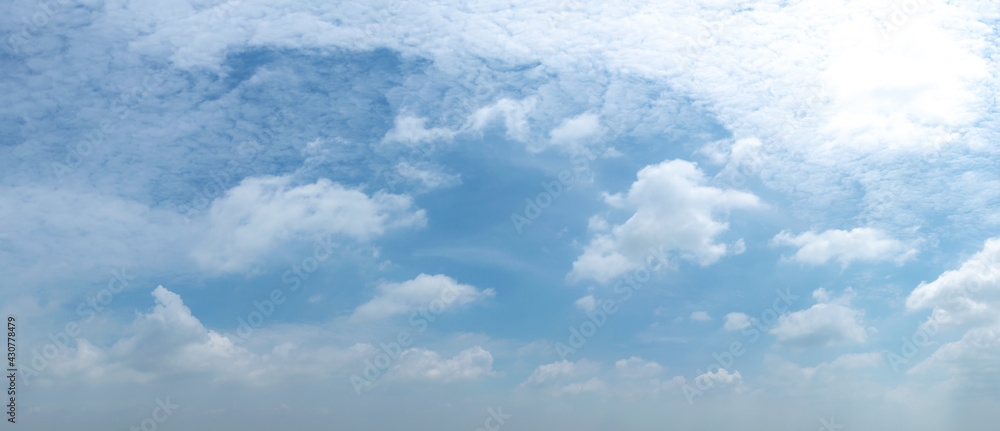 Wall mural blue sky background with tiny clouds. panorama white fluffy clouds in the blue sky.beautiful vast bl