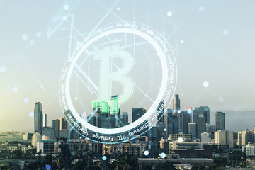 Virtual Bitcoin sketch on Los Angeles cityscape background. Double exposure