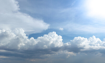 blue sky background with tiny clouds. panorama white fluffy clouds in the blue sky.Beautiful vast blue sky with amazing cloud background.Wide sky panorama with scattered cumulus clouds.