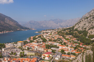 Naklejka na ściany i meble View of the city of Kotor from a high point on a sunny summer day. Montenegro 
