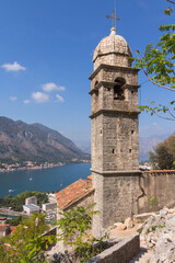 Wonderful view of the bell tower of the Church of Our Lady of Remedy standing on a hill in the town of Kotor. Montenegro 