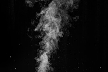 Close up of steam smoke on black background. Abstract smoke Weipa. Personal vaporisers fragrant steam. The concept of alternative non-nicotine smoking.