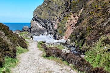 Footpath through country hiking route on a coastal walk uk