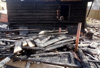 ashes, the remains of a burned down house