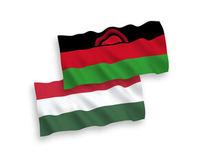 Flags of Malawi and Hungary on a white background