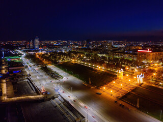 Volgograd embankment, promenade in the Park at night, aerial view from drone