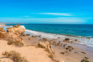 Fototapeta na wymiar Matador beach and beautiful landscape with rocks and ocean against blue sky, California
