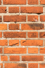 brick red wall. background of a old brick house.
