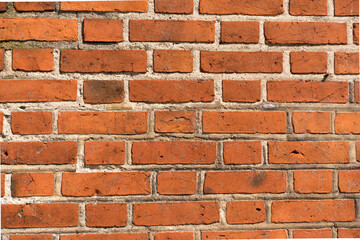 brick red wall. background of a old brick house.