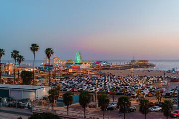 Fototapeta na wymiar Panoramic view of Santa Monica and the beach at sunset, night photo from above on Los Angeles, California