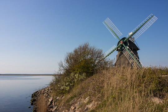 traditional dutch windmill by the Baltic Sea