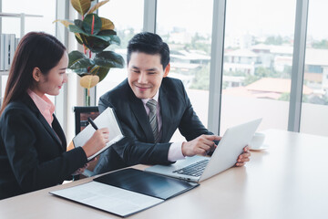 Workteam discussing new project in office.