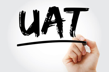 UAT - User Acceptance Testing acronym with marker, technology concept background