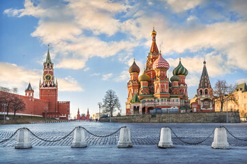 Spasskaya Tower of the Moscow Kremlin and St. Basil's Cathedral in Moscow - obrazy, fototapety, plakaty