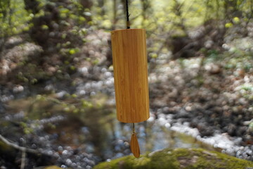 Koshi wind chimes outside in the forest for sound healing therapy, yoga and meditation, relax