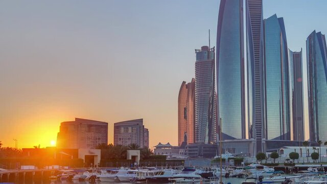 Al Bateen marina Abu Dhabi timelapse with modern skyscrapers on background