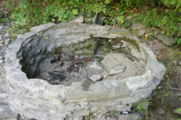 An ancient well on the bank of the Zhane River in a natural park in the North Caucasus