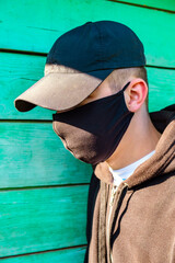 Young Man in Flu Mask