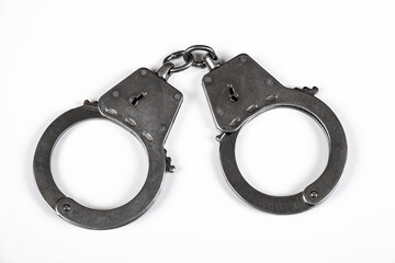 Handcuffs on the White