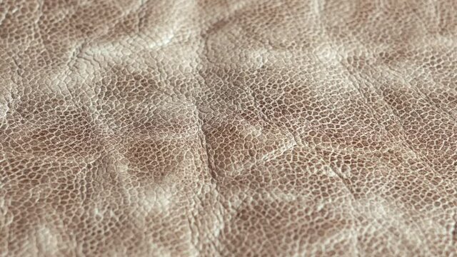 Brown leather, texture of real leather, pattern of real leather, close up shot, leather from which you can make shoes, bags and wallets, the concept of a tanner and working with leather