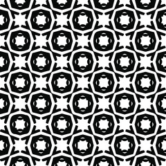  Geometric vector pattern with triangular elements. Seamless abstract ornament for wallpapers and backgrounds. Black and white colors.