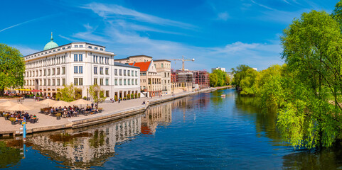 Panoramic view of historical downtown in Potsdam with river Havel and cafes and restaurants at blue sky in Spring, Germany. - obrazy, fototapety, plakaty