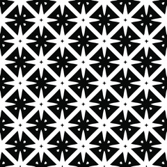  Geometric vector pattern with triangular elements. Seamless abstract ornament for wallpapers and backgrounds. Black and white colors.