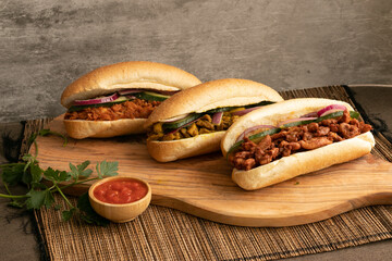 Indian Surinamese sandwiches filled with roti chicken curry,  cod fish or tandoori chicken 