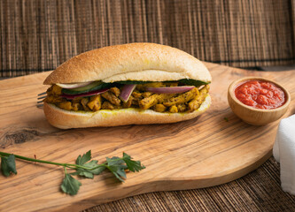 Indian Surinamese sandwiches filled with roti chicken curry,  cod fish or tandoori chicken 