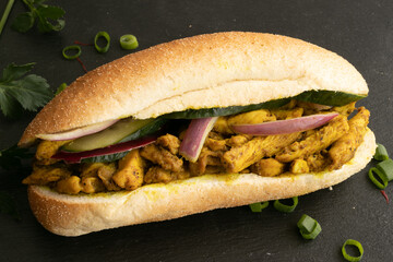 Indian Surinamese sandwiches filled with roti chicken curry,  cod fish or tandoori chicken 