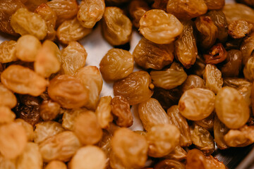 Organic dried grapes background. Healthy tasty background.