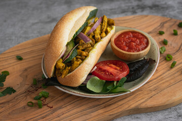 Indian Surinamese sandwiches filled with roti chicken curry,  cod fish or tandoori chicken 