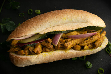 Indian Surinamese sandwiches filled with roti chicken curry,  cod fish or tandoori chicken 