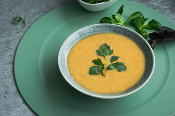 Dahl soup with yellow lentils on a table, lunch or dinning
